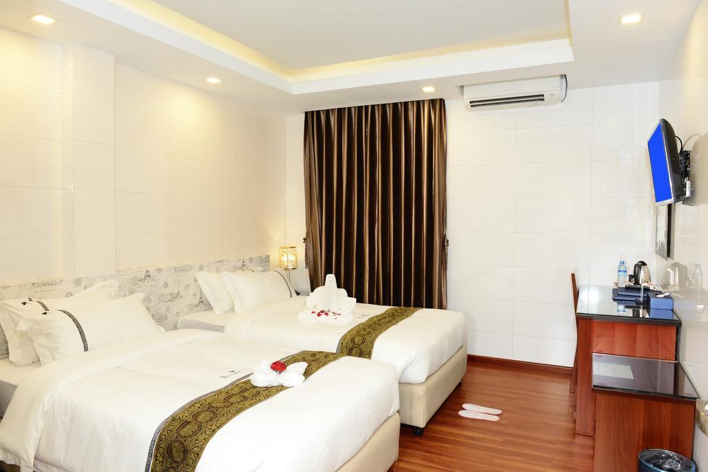 8Day Hotel Yangon Zimmer foto